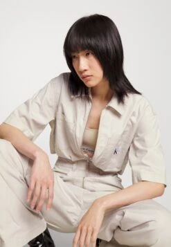 Calvin Klein Jeans Utility Back Cut Out BoilersuitTuta JumpsuitEggshell Donna Tute Jumpsuit C1821T00C-A11 -DeFacto Negozio 8dcdf8a0779641dbbea674330cf04f36